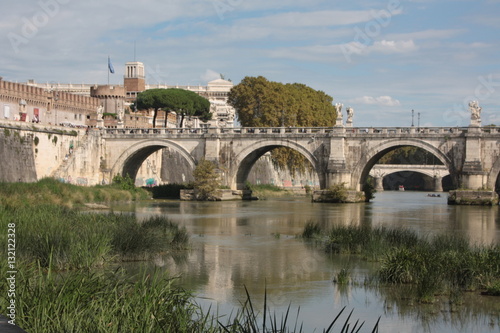 Rome bridge over the Tiber river © orsinico