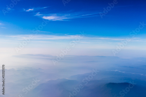 beautiful blue sky and cloud view from airplane. © sarawutnam