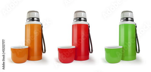 Color thermos flask with a cup isolated on white background. Orange, red, green