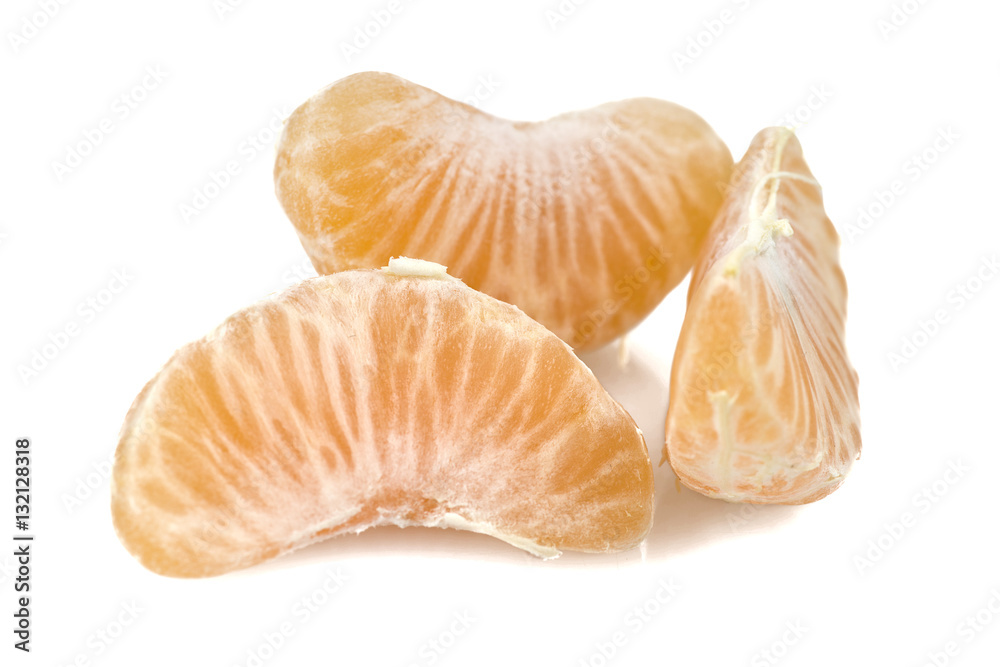 Mandarin or Tangerine fruit with leaves on a white background Mandarin or Tangerine fruit with leaves on a white background