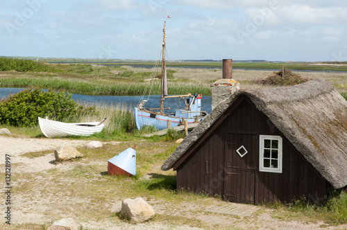 Fischerhütte und zwei Boote am Ringköbing Fjord, Jütland, Dänemark photo