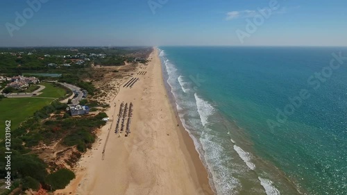 Aerial. Famous beach Garrao filmed from the sky, Vale de Lobo.