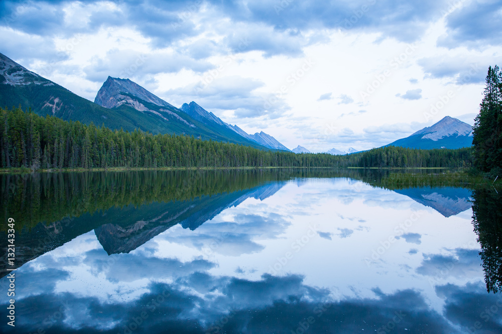 Amazing reflection view of Honeymoon Lake in Jasper National Park, Canada.