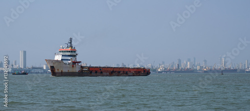 Tableau sur toile Commercial shipping at anchor in the Arabian Sea outside Mumbai, India's busiest