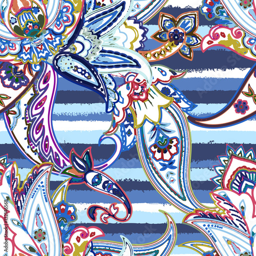 Colorful paisley pattern on pastel striped background