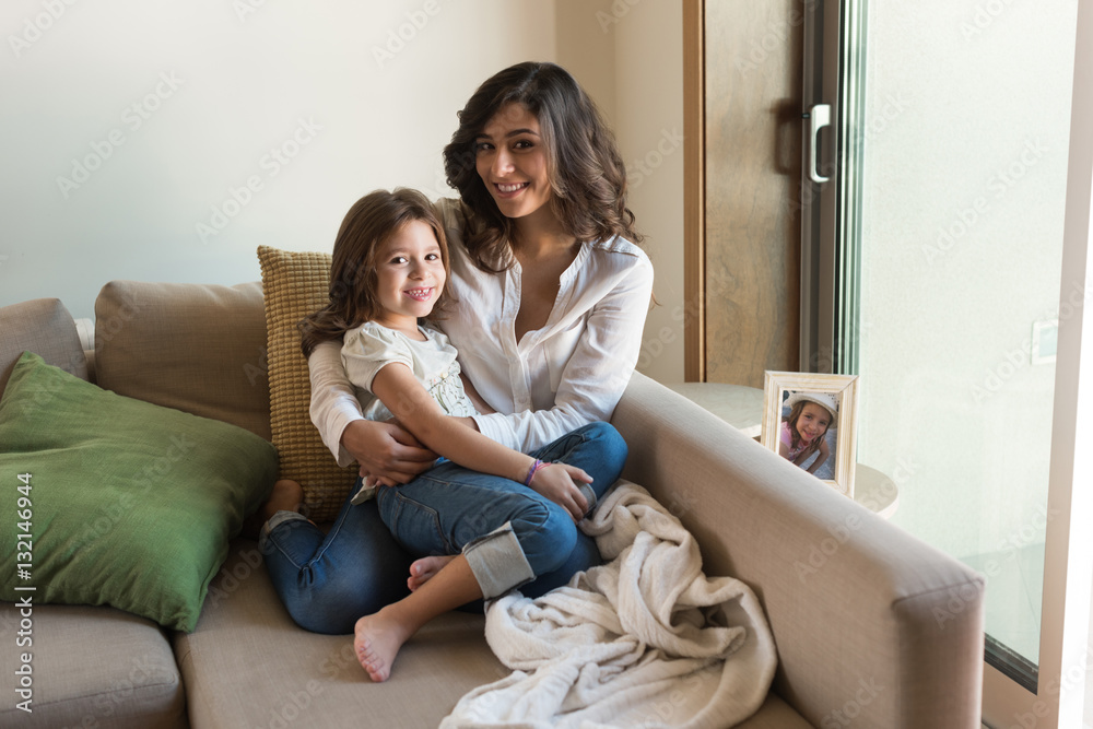 Mother and daughter at home