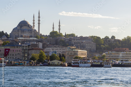 Hagia Sofia & Blue Mosque Viewed from along the Bosphorus sea over the Galata Bridge.