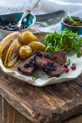 Sliced venison steak dinner