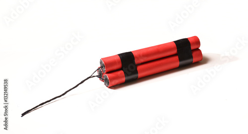 Una dinamita roja en fondo blanco photo