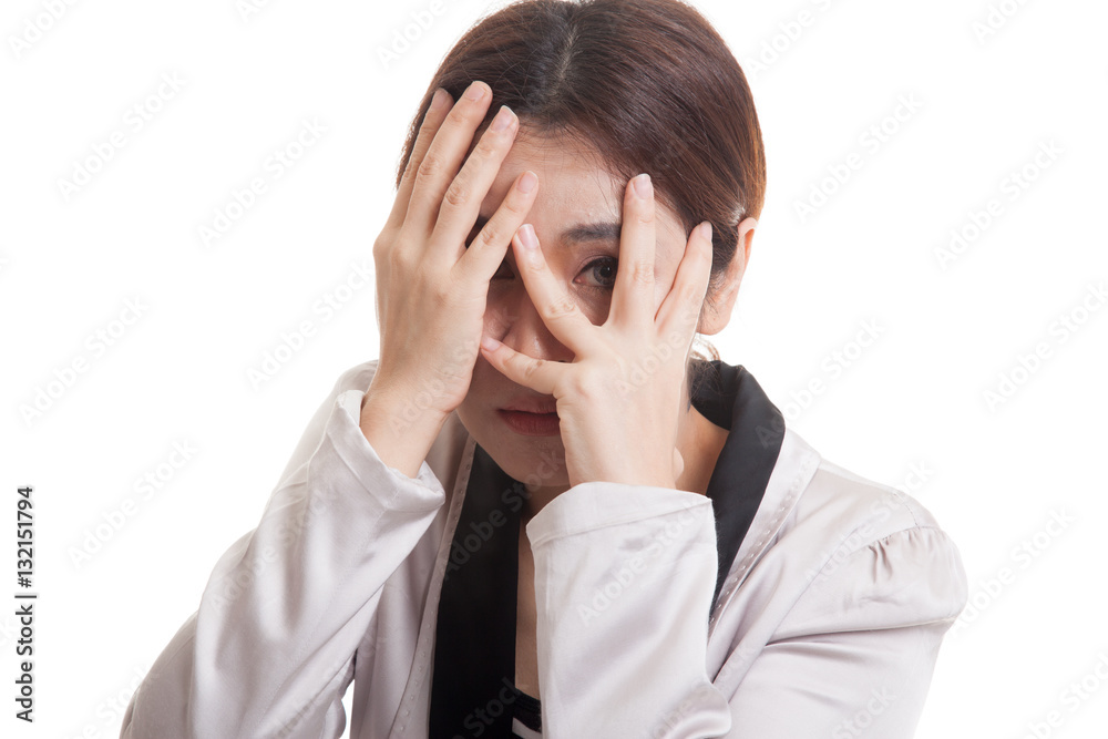 Beautiful young Asian woman peeking through fingers. Beautiful young Asian woman peeking through fingers.
