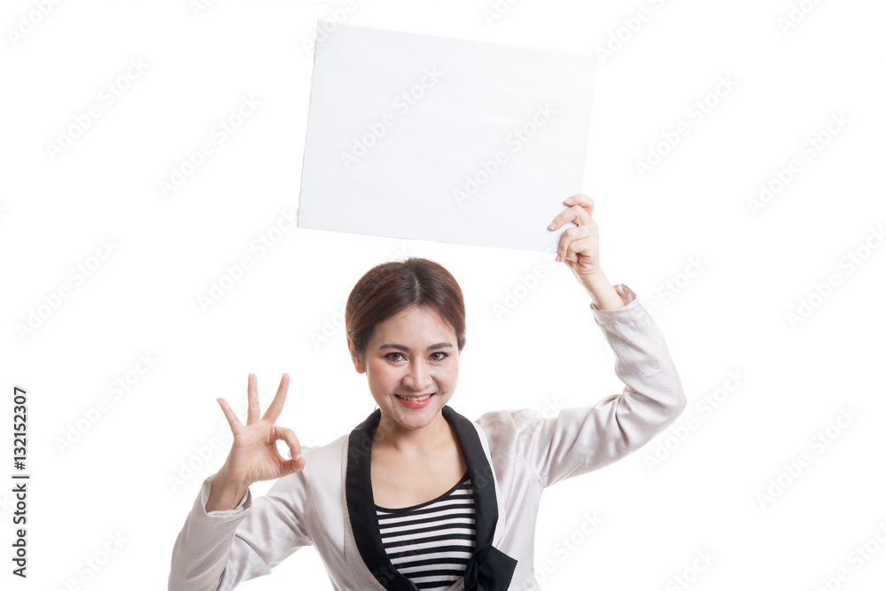 Young Asian business woman show OK with white blank sign. Young Asian business woman show OK with white blank sign.