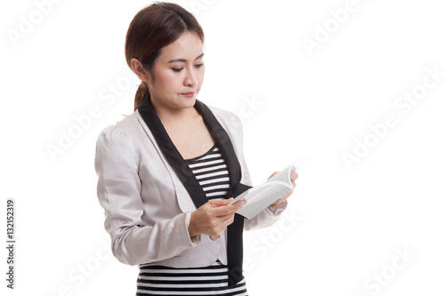 Young Asian business woman with a book.