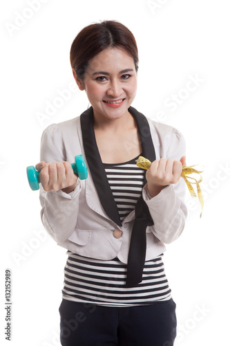 Healthy Asian business woman with dumbbells and measuring tape.