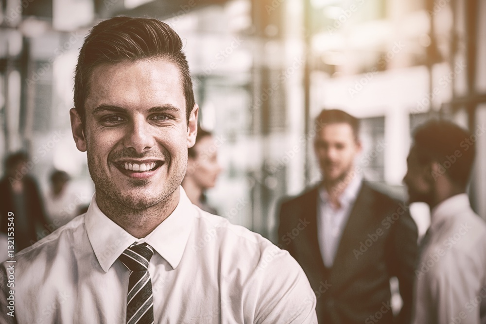 Portrait of happy businessman with colleagues Portrait of happy businessman with colleagues