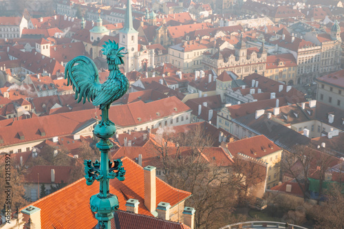 Bronze weathercock at the roof of St Vitus' Cathedral at Prague Castle