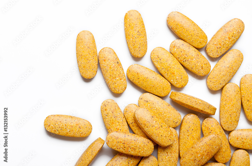 dietary supplement. multivitamin tablets on white background dietary supplement. multivitamin tablets on white background