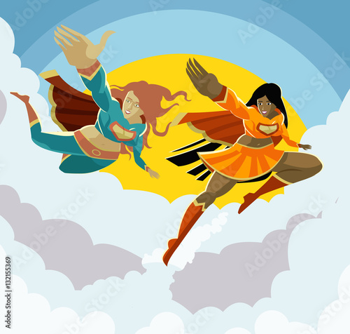 caucasian and african superhero girls flying together in the sky with clouds photo