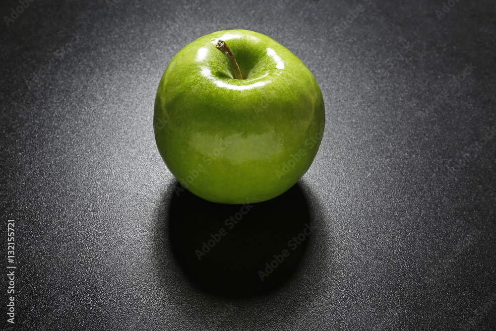 green apple on black background green apple on black background
