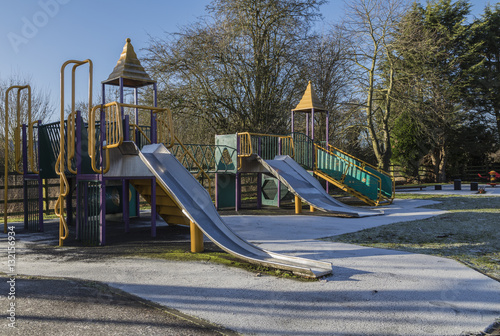 Frosty Playground / An image of a colorful children's playground on a cold frosty morning in the UK