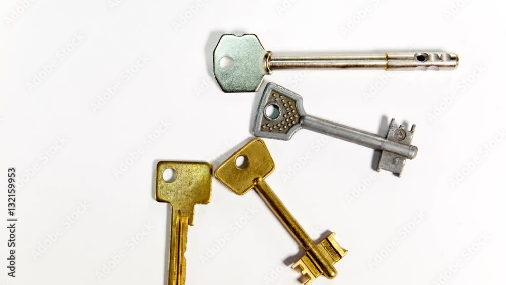 keys of various form, on a white background. time lapse keys of various form, on a white background. time lapse