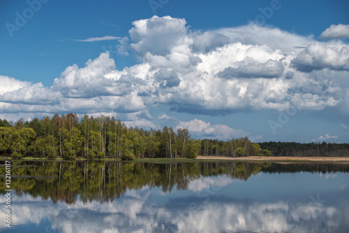 Landscape of sky with clouds pond Beautiful white billowing against a blue .