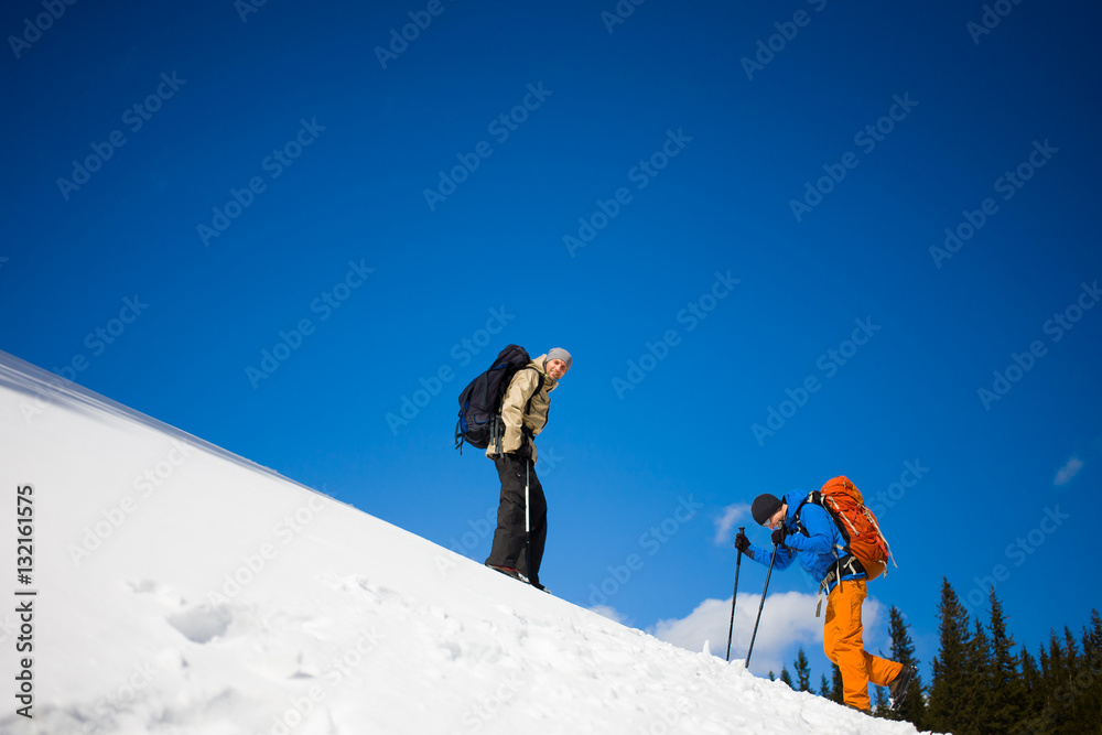 Climbers on a snow slope.