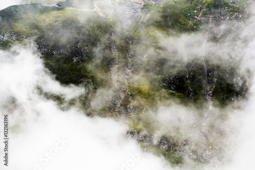 Landscape from Bucegi Mountains, part of Southern Carpathians in Romania in a very foggy day   © ileana_bt