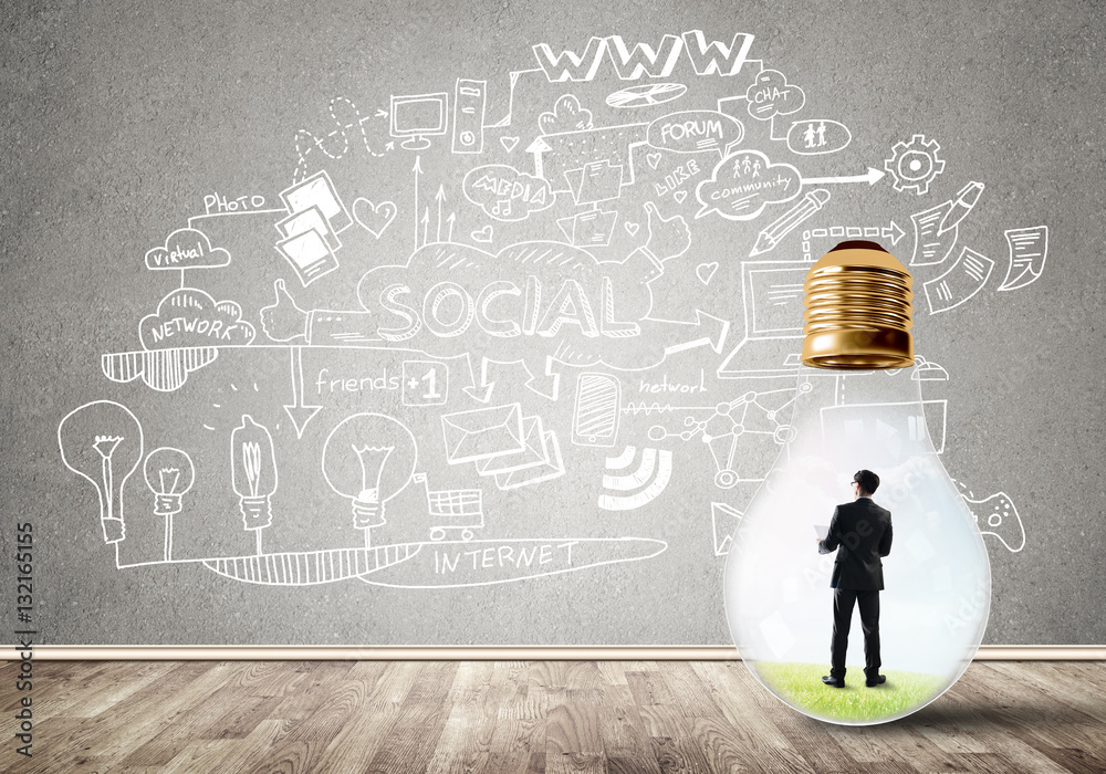 Businessman trapped in bulb Businessman trapped in bulb