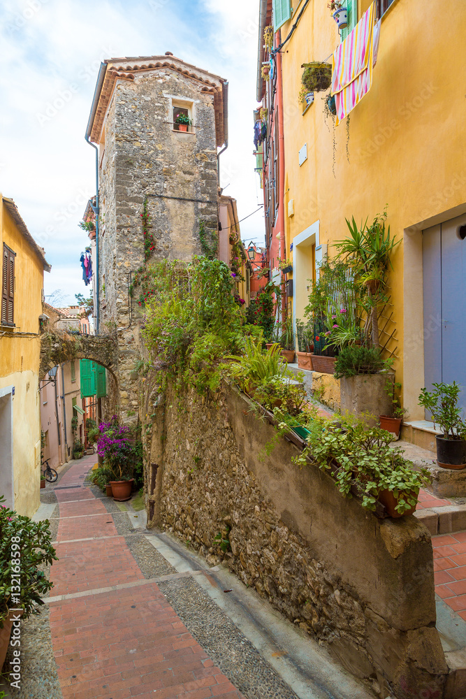 Old narrow street in Menton, France