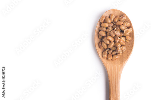 Natto. Fermented soybeans into a spoon photo