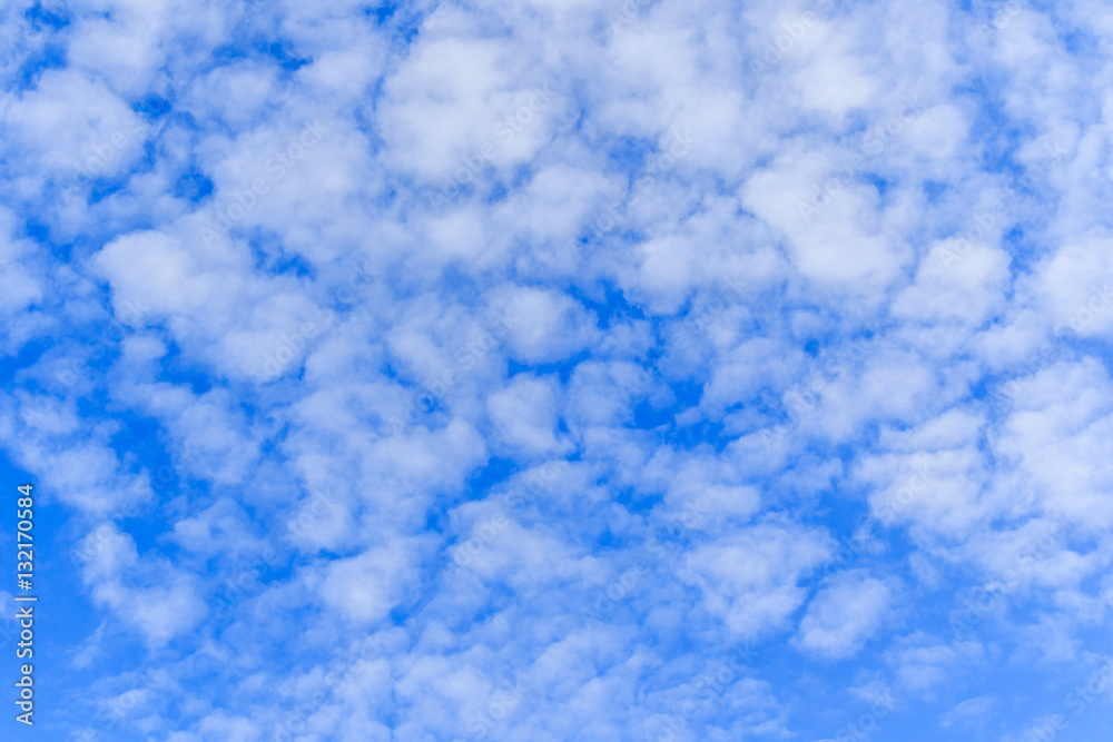 Blue sky background with tiny clouds Blue sky background with tiny clouds