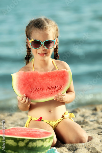Cute girl eating watermelon...