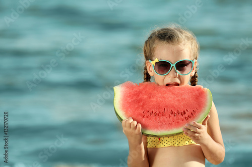 Cute girl eating watermelon...