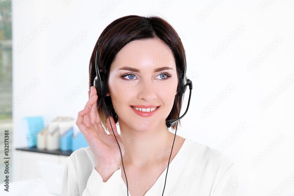 Young beautiful technical support dispatcher working, closeup Young beautiful technical support dispatcher working, closeup