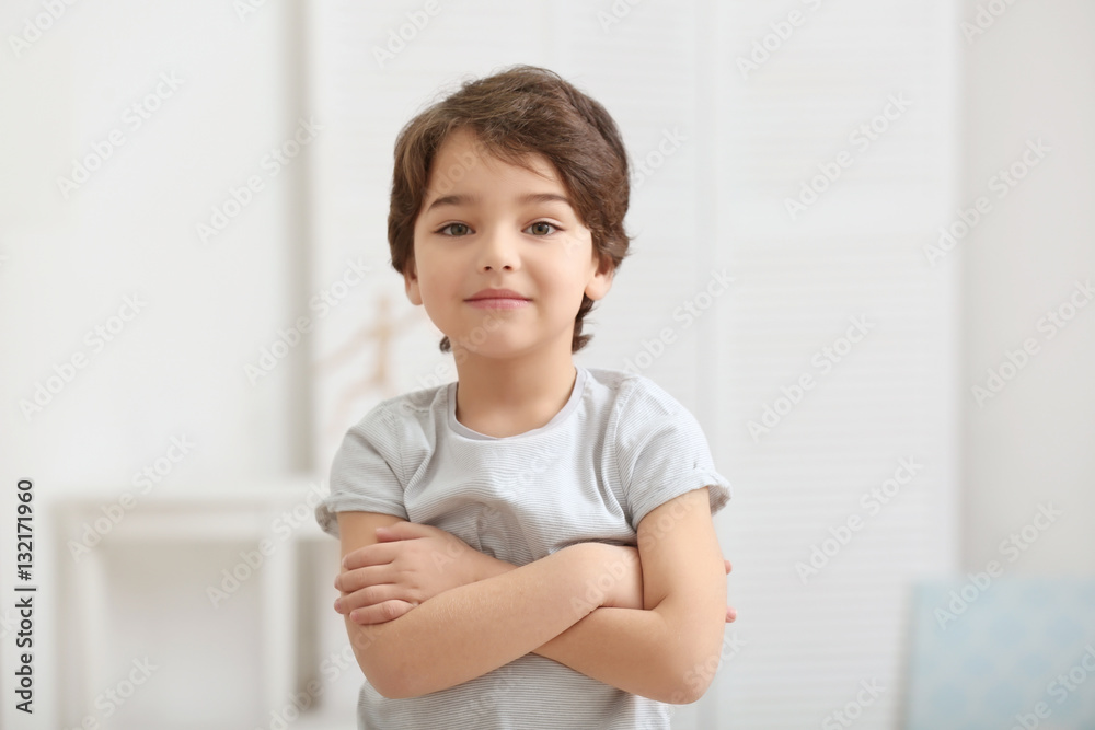 Cute emotional little boy on light blurred background Cute emotional little boy on light blurred background