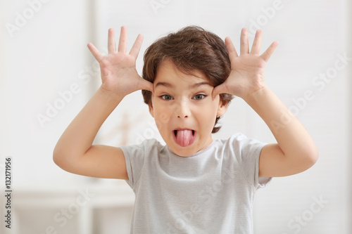 Cute emotional little boy o...