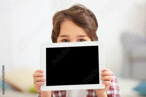 Cute emotional little boy w...