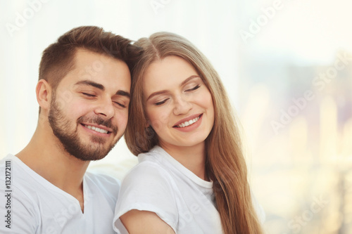 Portrait of young couple on...