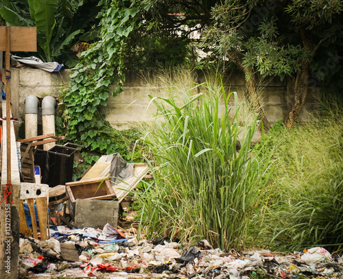 splattered scrap heap at backyard photo taken in Semarang Indonesia