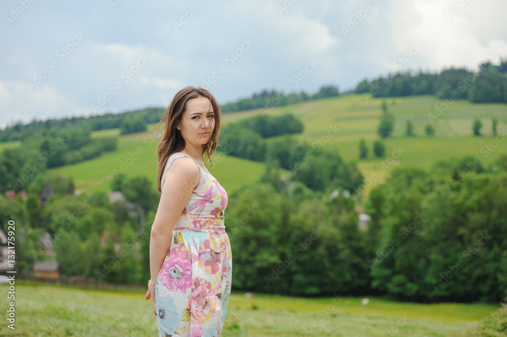 Brunette girl enjoying journey in mountains. Brunette girl enjoying journey in mountains.