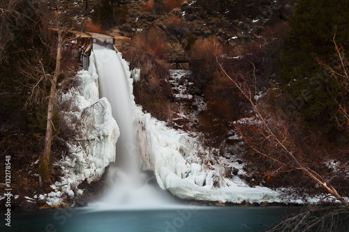 Frozen waterfall coming from an old logging flume