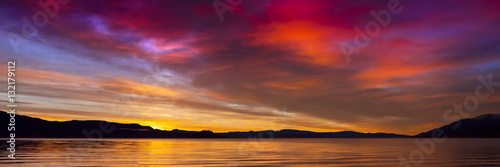 Sunrise at Pyramid Lake, Nevada. Striking vivid colors in the sky. © neillockhart