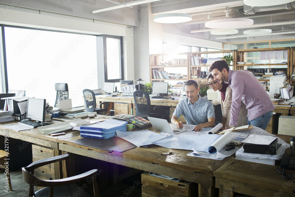 Architects working together in the office Architects working together in the office