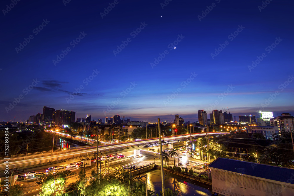Long exposure night cityscape with twilight sky background landscape