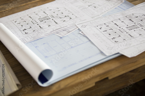 Blueprints on office desk