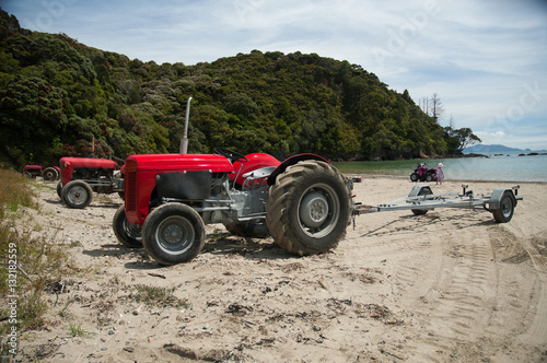 Massey Ferguson boat Tractors on the beach photo