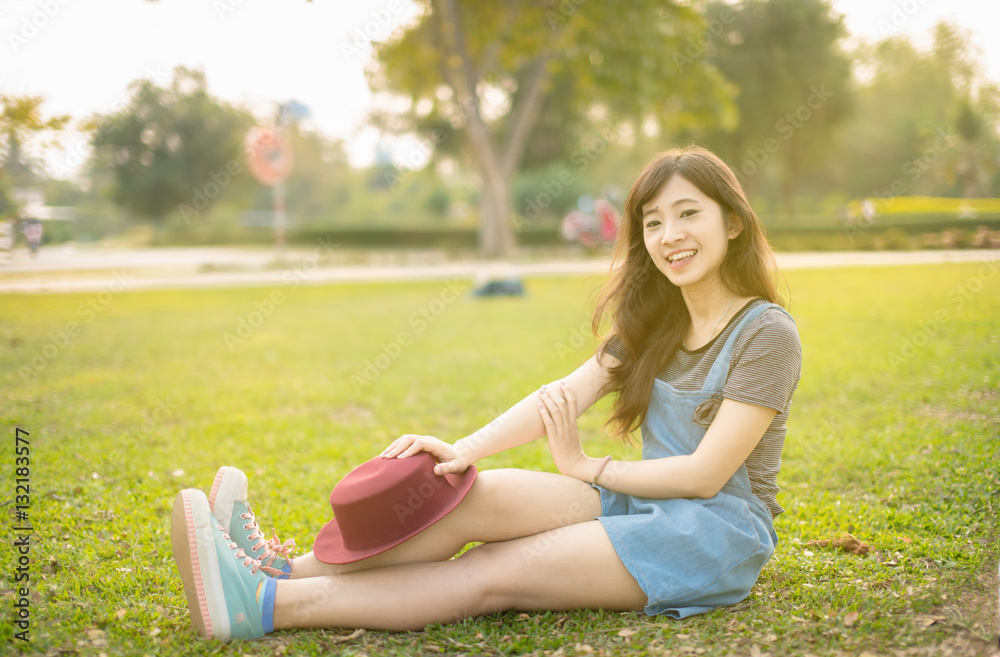 Portrait asian woman smiling happy freedom in park with sunlight Portrait asian woman smiling happy freedom in park with sunlight