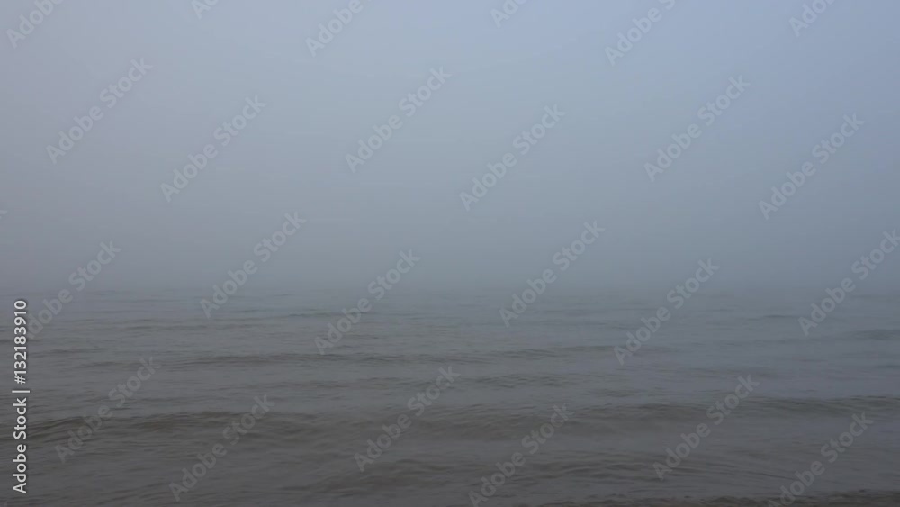 Nature scene with dense fog on water Nature scene with dense fog on water