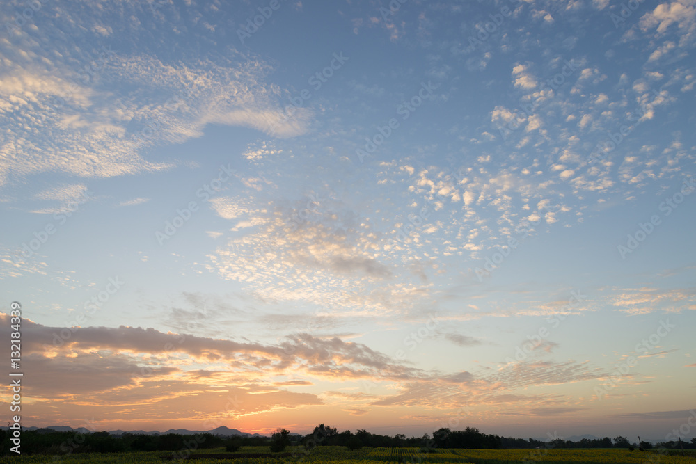 Beautiful sunset sky with rays of light shining clouds and sky Beautiful sunset sky with rays of light shining clouds and sky