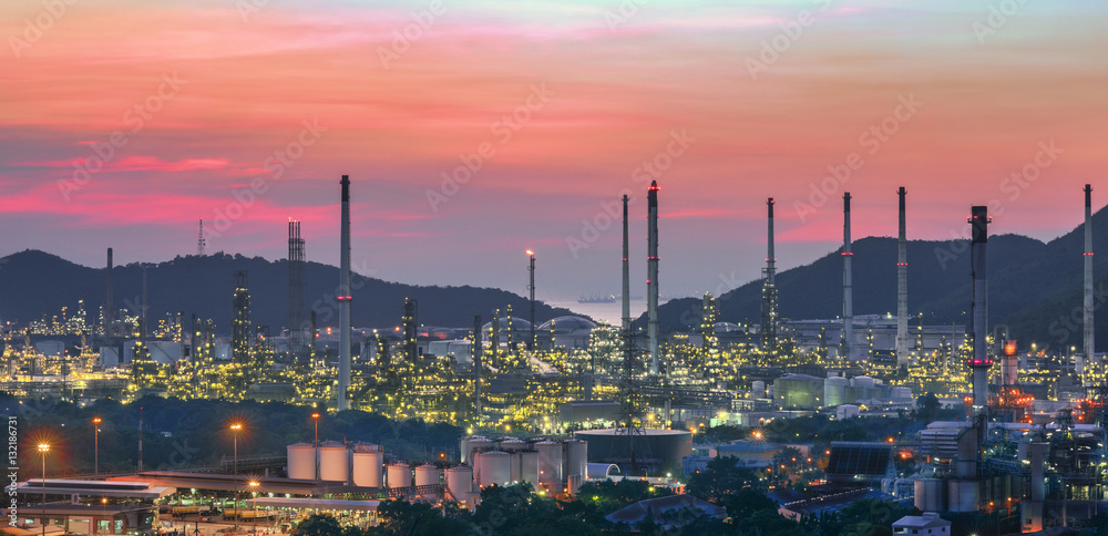 Oil refinery plant at sunset